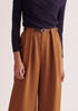Paisie Belted Pleated Wide Leg Trousers in Brown Close Up
